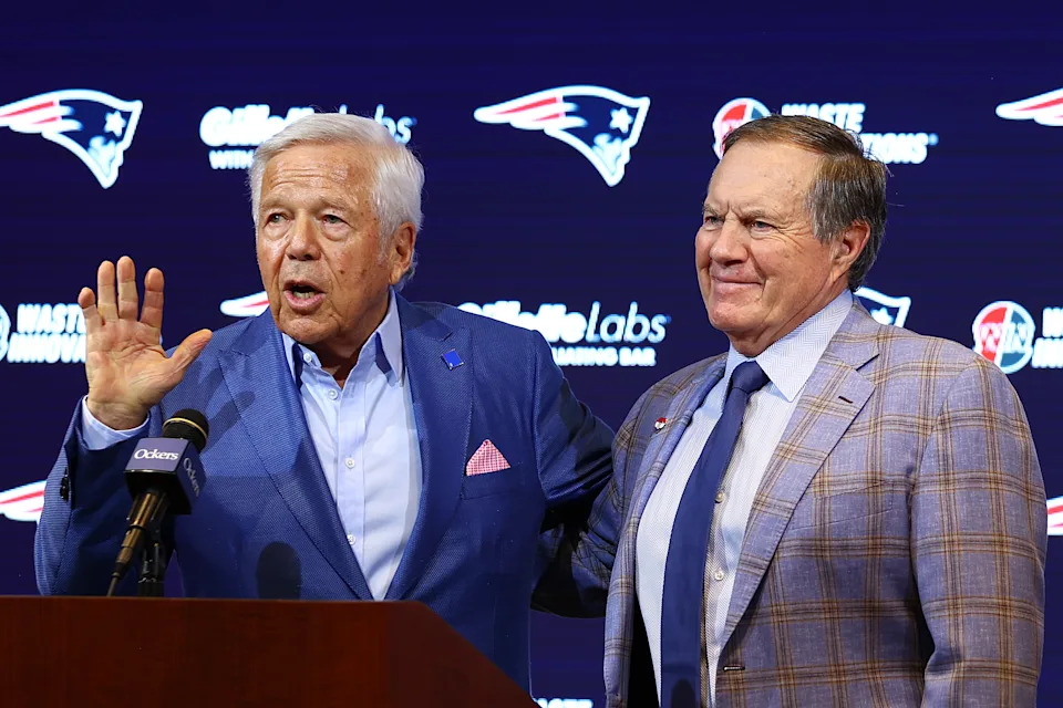 Owner Robert Kraft (L) speaks to the media as head coach Bill Belichick (R) of the New England Patriots looks on during a press conference at Gillette Stadium on January 11, 2024 in Foxborough, Massachusetts. Belichick announced he is stepping down as head coach after 24 seasons with the team. (Photo by Maddie Meyer/Getty Images)