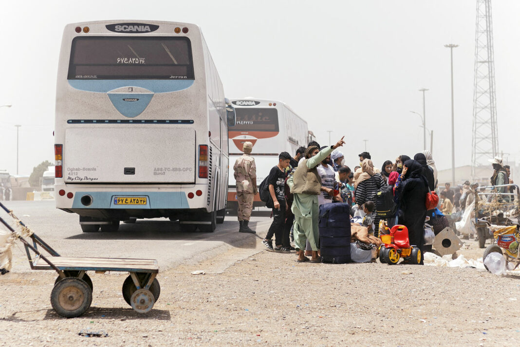 Bus crash kills more than 70 Afghans deported from Iran, including 17 children
