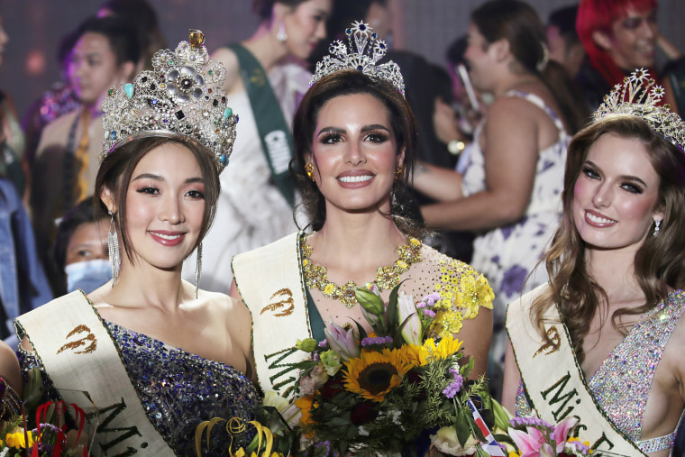 Nadeen Ayoub, center, smiles.