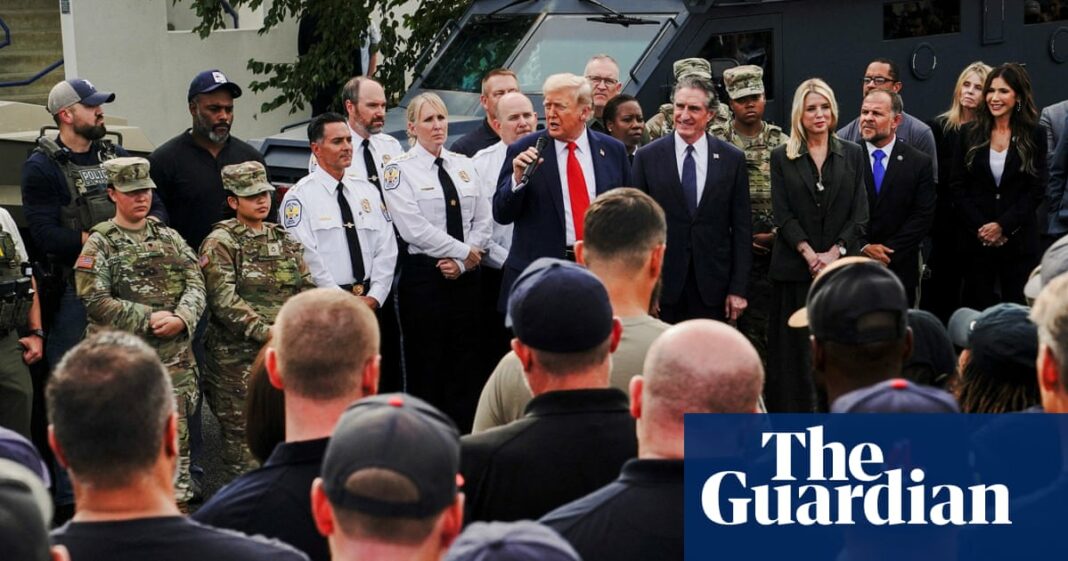 Trump visits DC police station and boasts of success of crime crackdown
